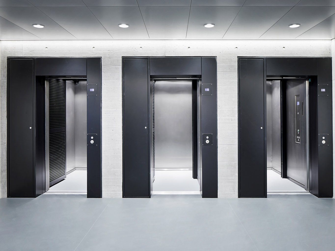 Three Schindler elevators in one view